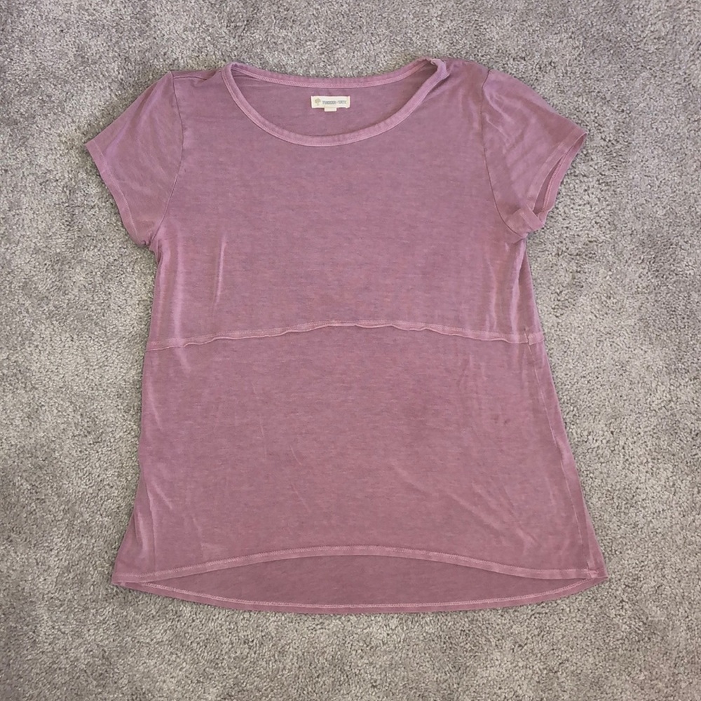 Lavender short sleeve shirt.
